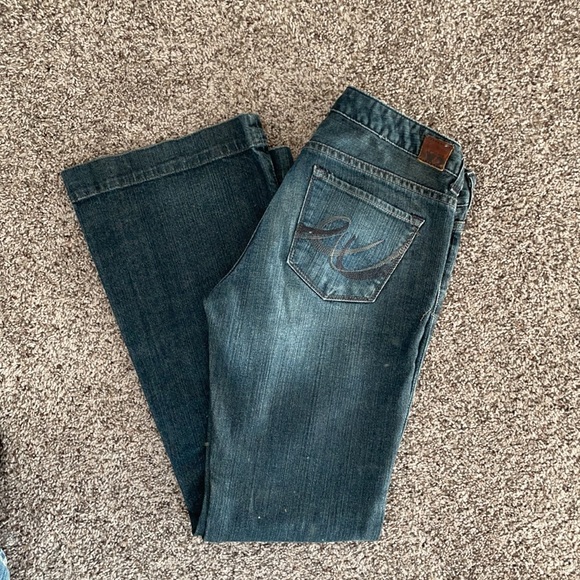 X2 mid rise flared distressed denim jean - Picture 3 of 4